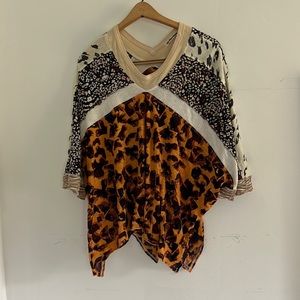 We the free for free people mixed print tee. Size medium